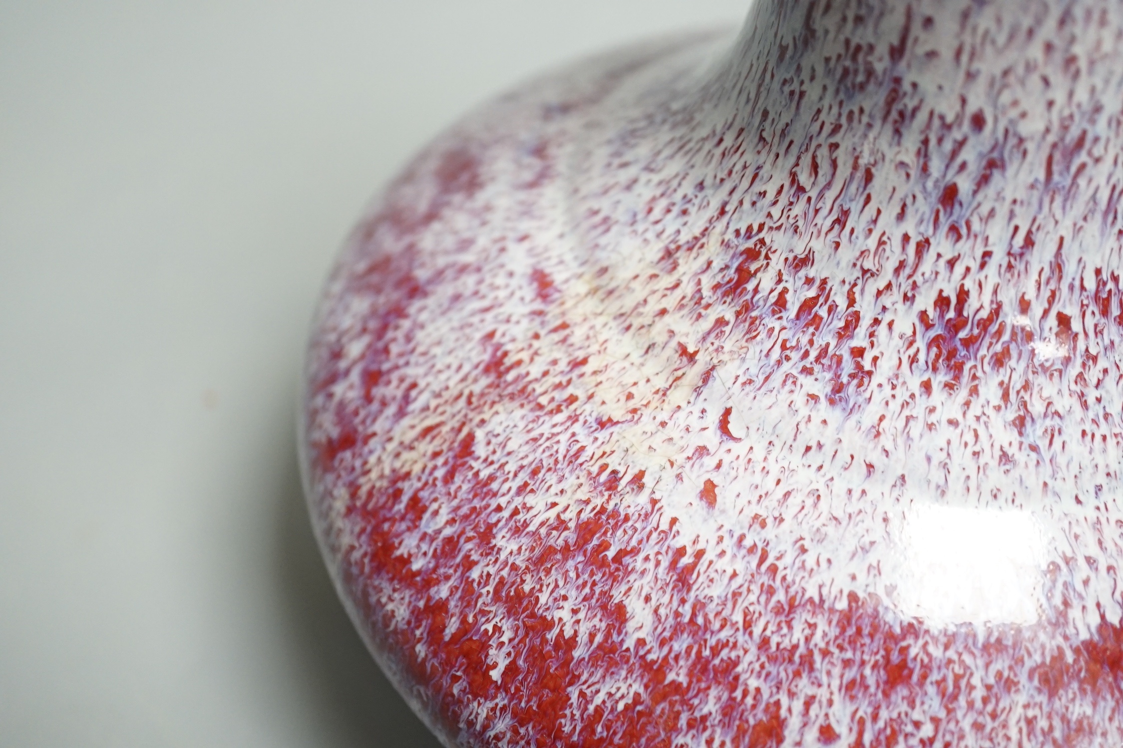 A Chinese flambe glazed vase - 24.5cm